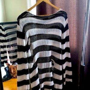 Black and white striped edgy ripped sweater